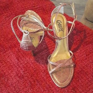 Strappy high heeled shoes